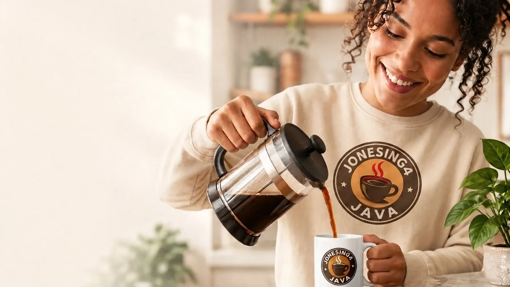 A coffee lover pouring fresh coffee into a mug at home